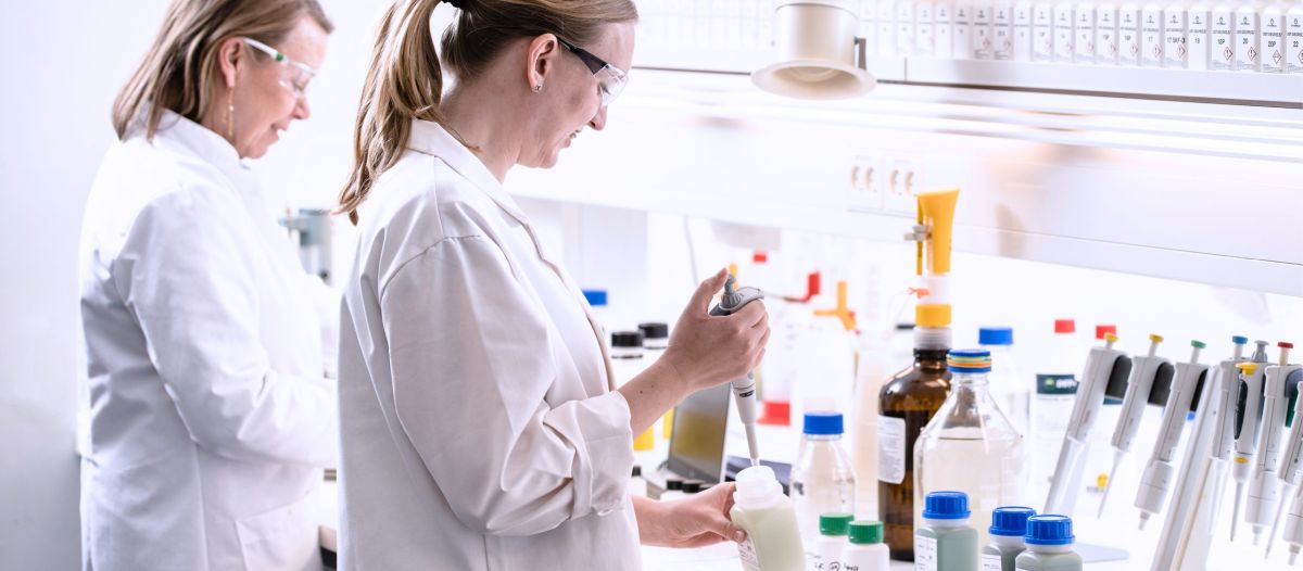 DST_CHEMICALS laboratory two chemists working